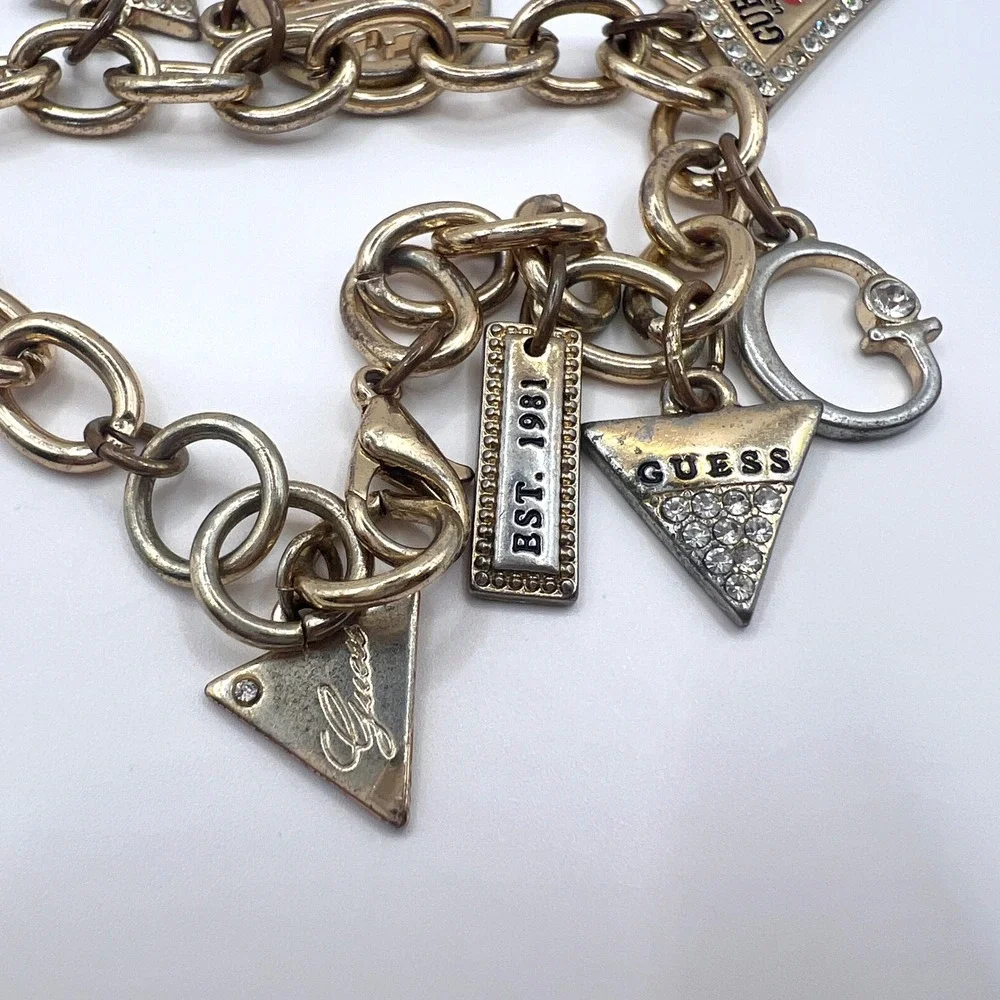 GUESS Vintage Gold Tone Charm Bracelet Rhinestone Logo Est 1981 Y2K Signed
